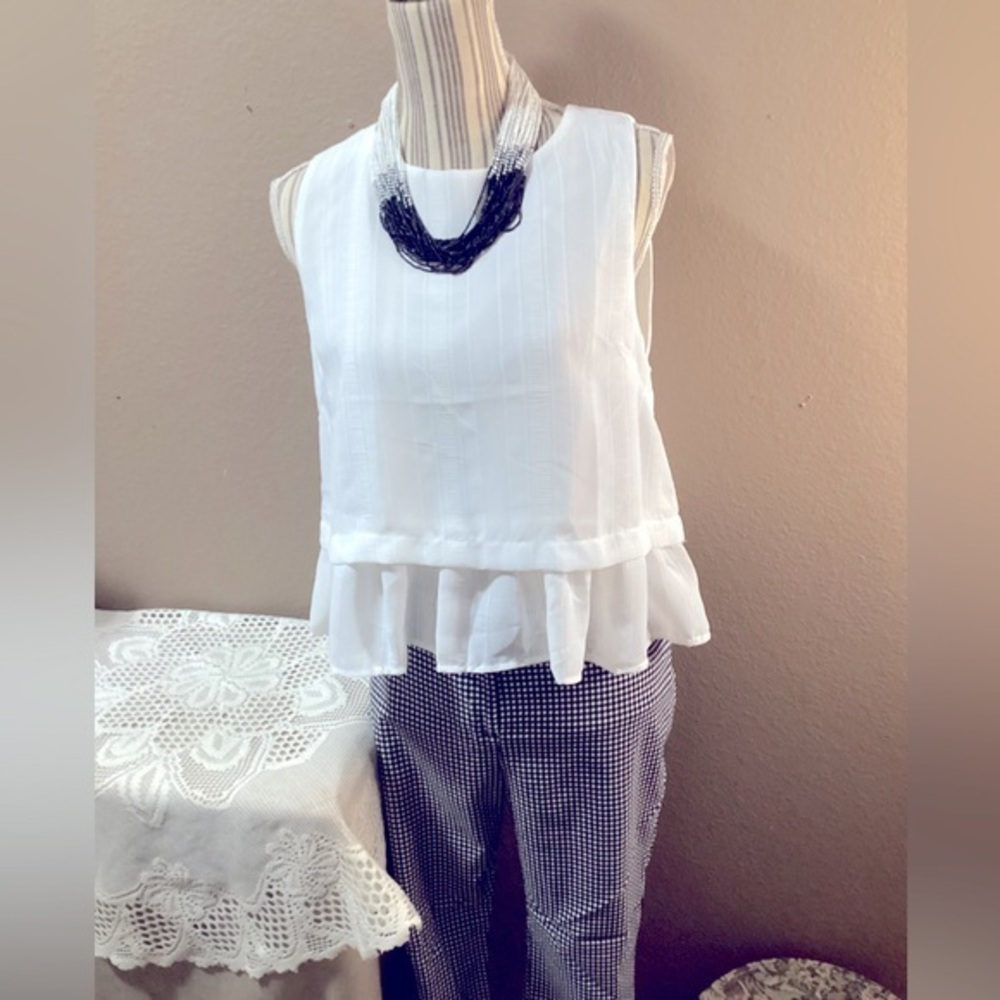 Sleeveless White Ruffle-Hem Blouse - Women's Top